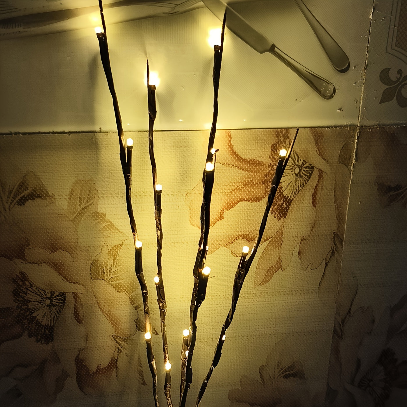 20 LED Branch Lights for indoor decoration, ideal for weddings, birthdays, and Christmas. Features a branch design. Requires 2 AA batteries (not included).