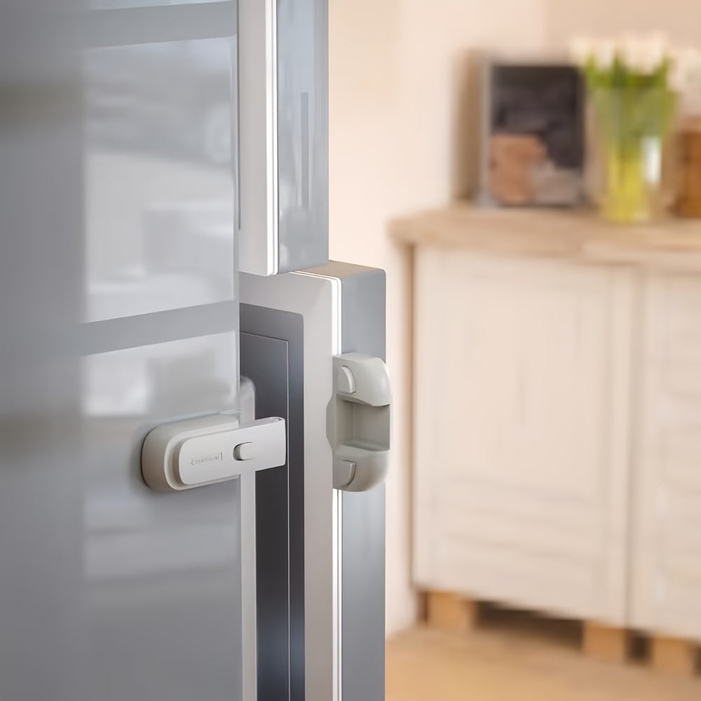 Safety latch for refrigerator door designed specifically for young children - made from non-toxic plastic for a secure, child-proof closure.