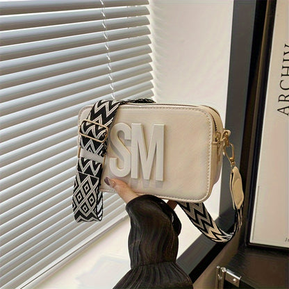 Fashionable PU crossbody bag with adjustable wide strap and zigzag pattern in multiple colors.