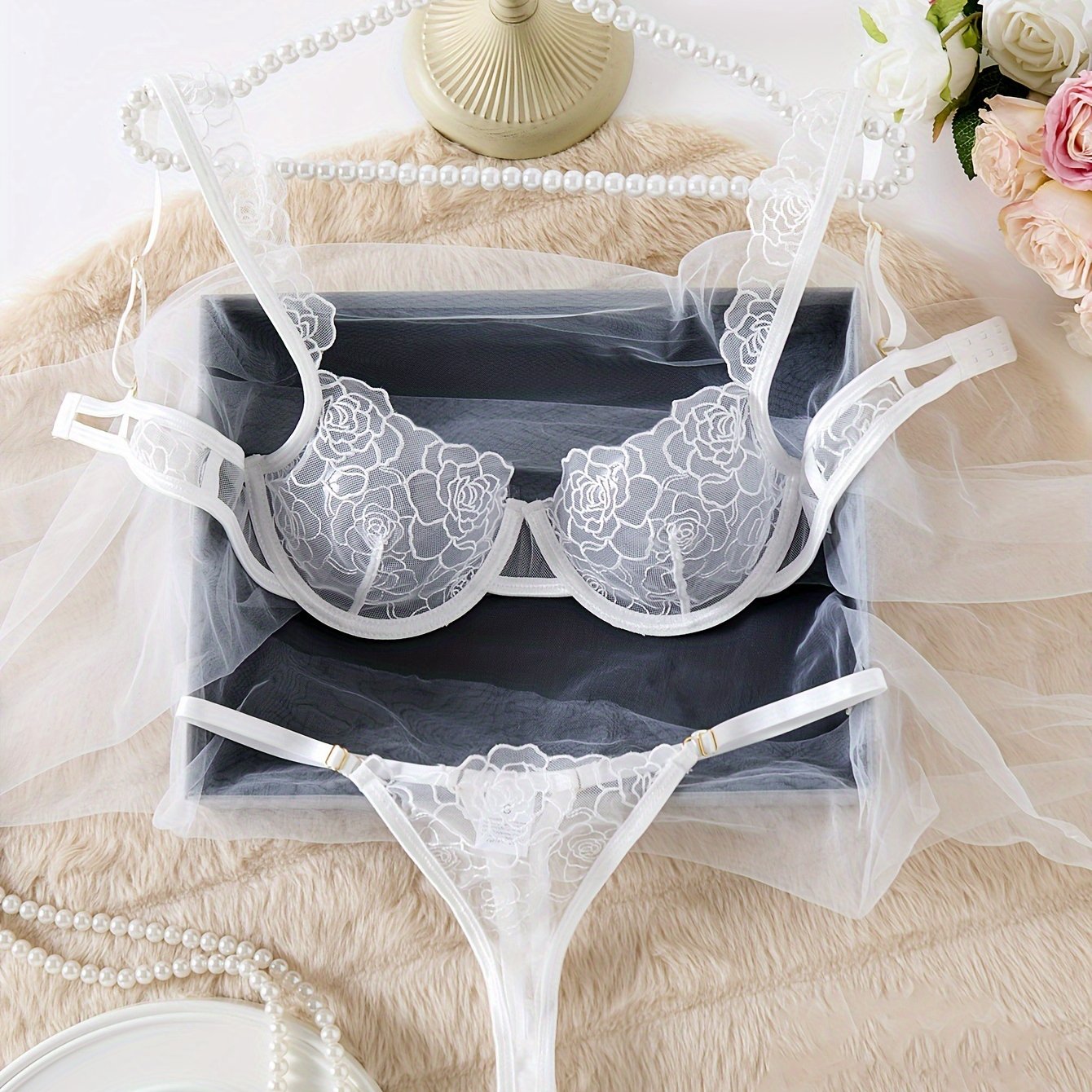 Sheer floral embroidered lingerie set with breathable solid color bra and thong for women's sexy lingerie.