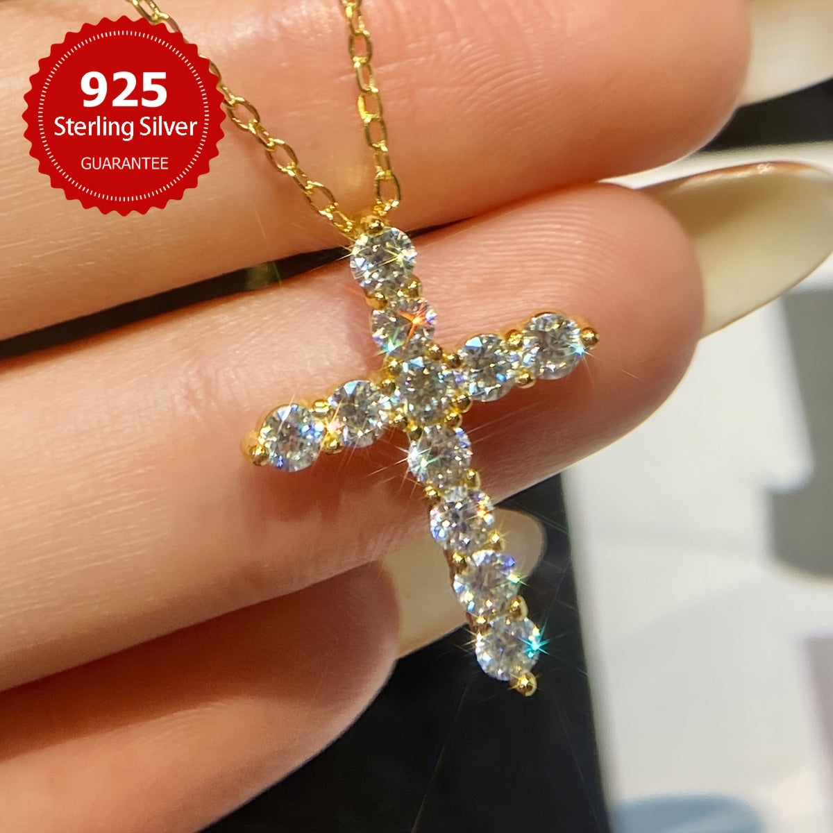 The stunning Mozambique stone cross pendant necklace features a 1.1 carat stone set in S925 sterling silver, making it a luxurious Valentine's Day gift for the special lady in your life. This exquisite piece of ladies' jewelry includes 11 0.1 carat