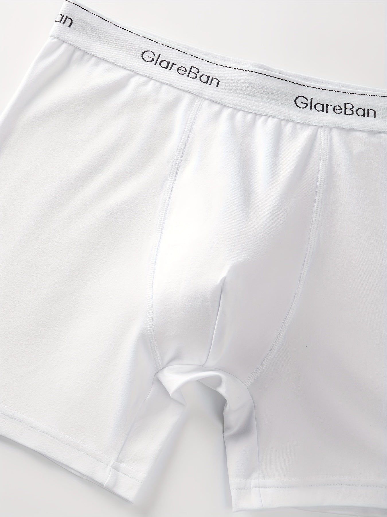 5 Men's white boxer briefs made of comfortable polyester and elastane blend, machine washable.