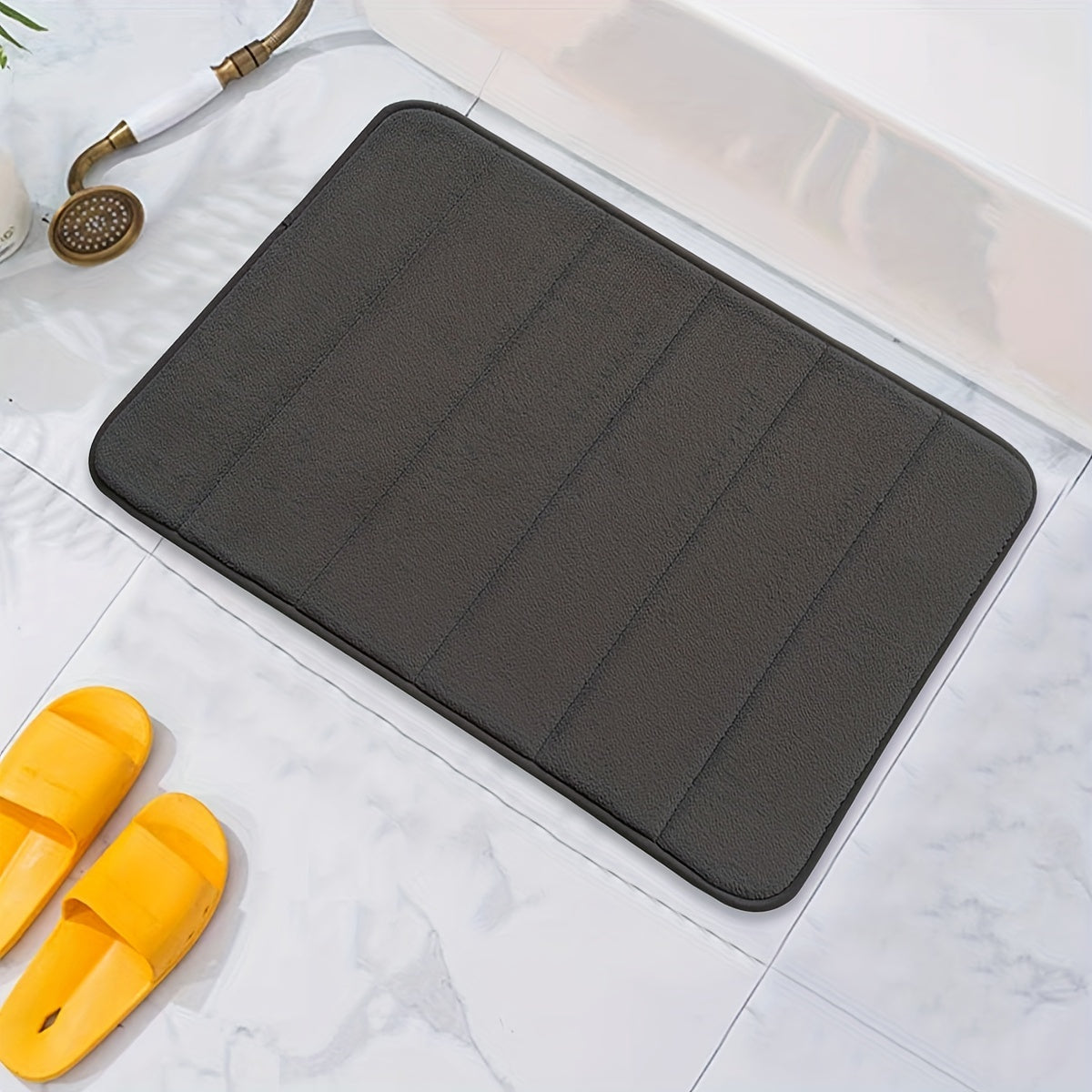 1 piece of Memory Foam Bath Mat designed for the bathroom, featuring a non-slip surface and thickened soft material that quickly absorbs water and dries fast. This machine-washable mat can also be used as a shower mat, living room or bedroom entrance