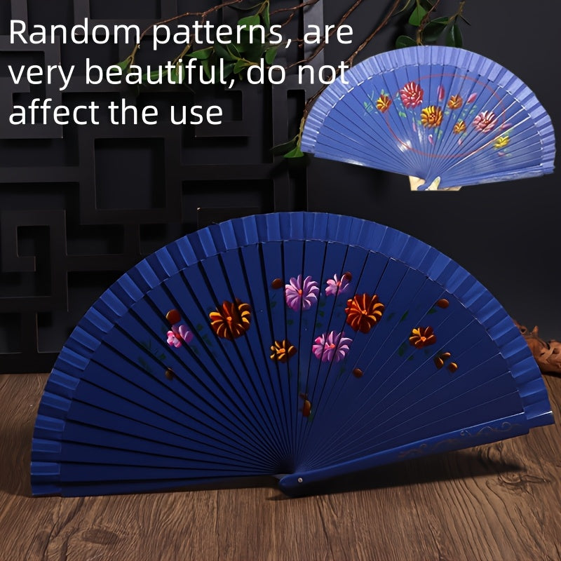 Wooden Spanish folding fan for dancing and home decoration with printed design, conveniently folds for easy storage.