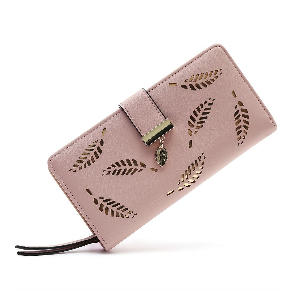 Black synthetic leather women's wallet with golden leaf design, featuring card holders, coin pouch, and snap closure.