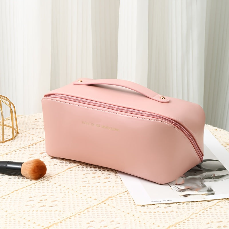 Yiwu-produced chic pink PU cosmetic case for women with large capacity and durable edge paint, featuring a chic pillow shape and polyester lining.