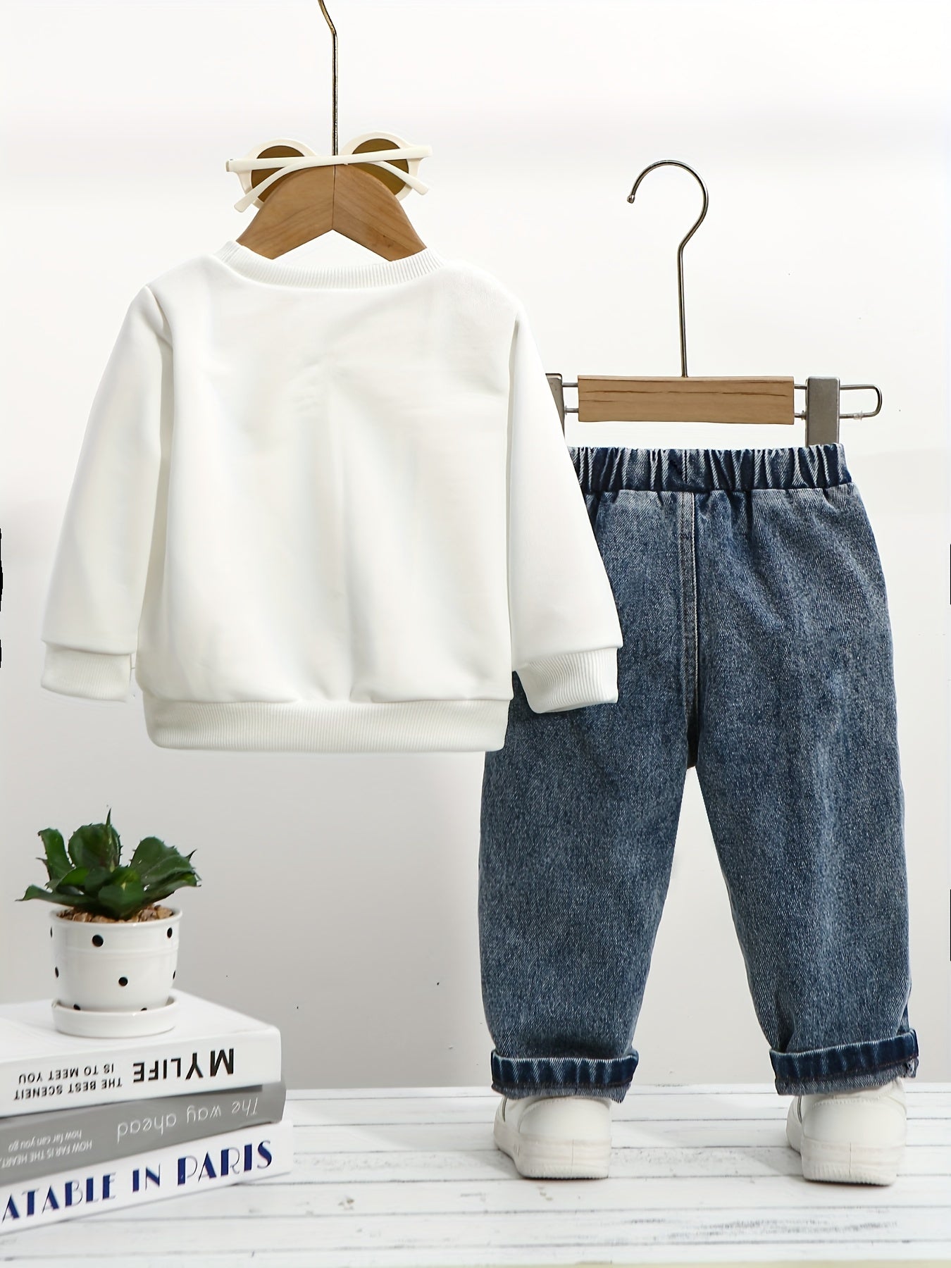 2 piece baby boy outfit set featuring a casual crew neck sweatshirt with "Mommy's Lucky Boy" print and matching denim jeans. Made from cotton blend knit fabric, perfect for the fall/winter