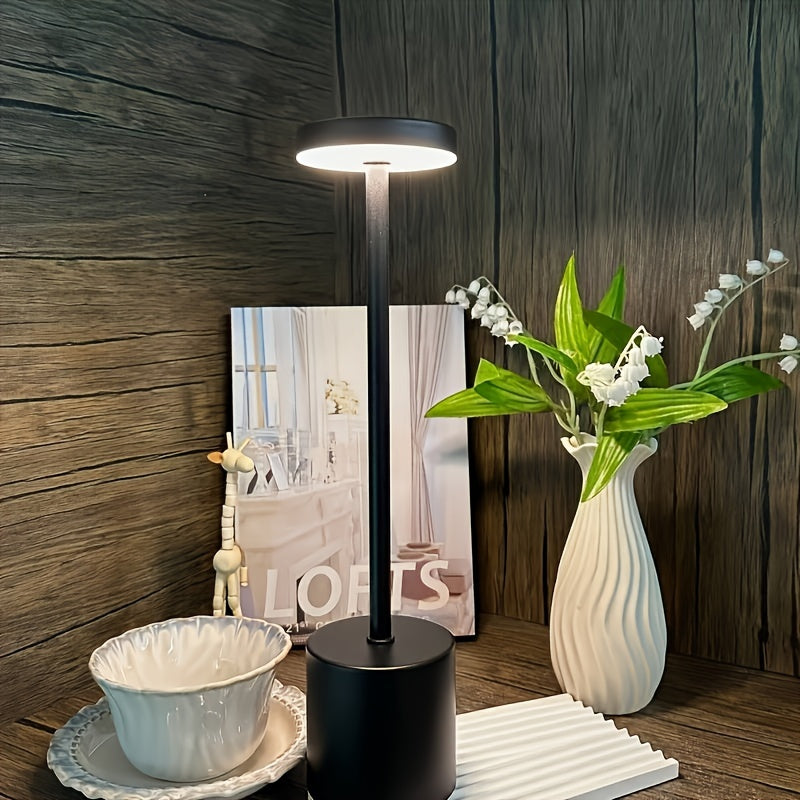 Contemporary touch control table lamp with adjustable LED lighting and rechargeable night light in 3 colors, perfect for adding ambiance to any room.