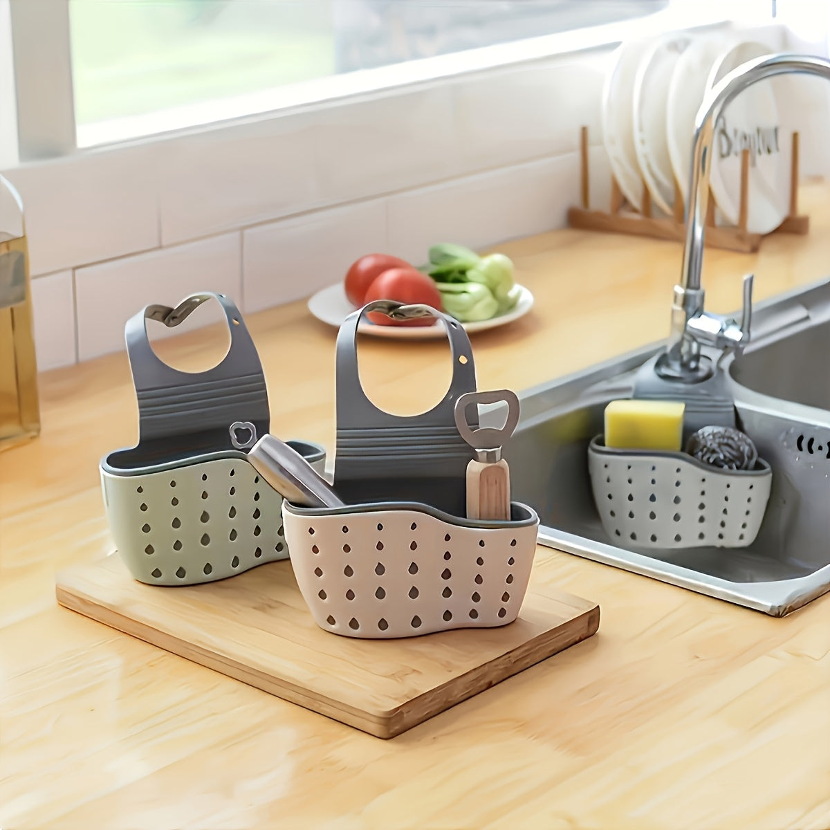 Get organized in the kitchen with the 1pc Modern Plastic Kitchen Sink Drain Basket. This versatile and adjustable hanging rack is perfect for storing sponges, soap, and cleaning tools. The perforated design allows for efficient draining and is ideal for