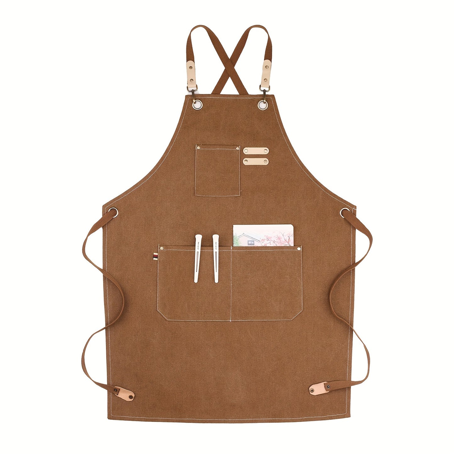 Sturdy brown canvas apron with adjustable straps & multiple pockets, ideal for coffee shops, restaurants, and home kitchens.