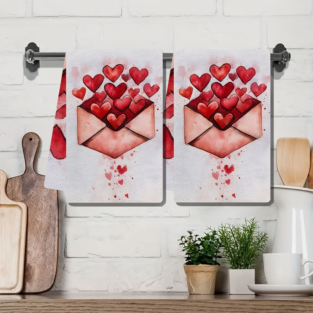 Two romantic Valentine's Day kitchen towels are available for purchase. These ultra soft and highly absorbent polyester dish hand towels measure 40.64x60.96 cm and feature a heart envelope design. They are machine washable and are ideal for holiday decor