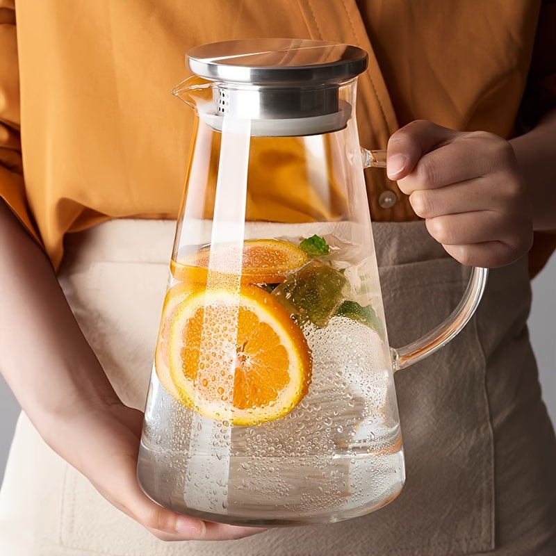 Heat resistant glass pitcher with lid, perfect for hot/cold drinks. Featuring a 1.8L clear beverage carafe with handle for easy serving. Ideal for home, restaurant, or office use. Easy to clean and makes a great gift for Christmas or New Year. A