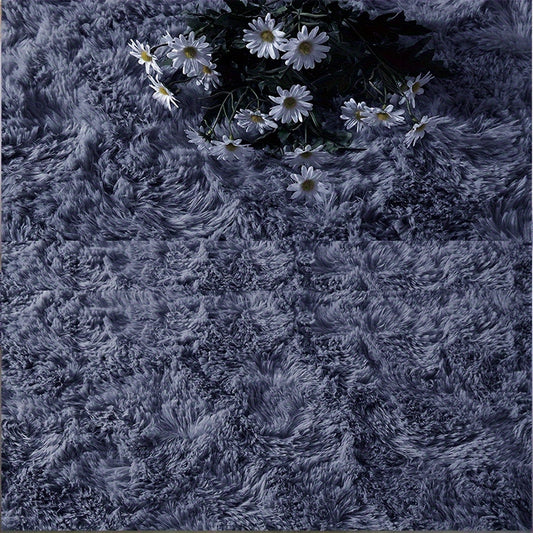 This modern, simple area rug is soft and fluffy, made from polyester for a cozy atmosphere in your bedroom, living room, study, lounge, or entertainment area. It is non-shedding and easy to clean, but should be dry cleaned only. Suitable for indoor areas