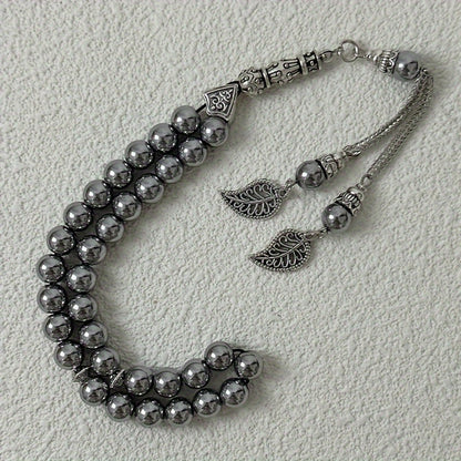 Vintage Ethnic Style Tree Leaf Spike with 33 8mm Hematite Beads, Muslim Prayer Beads Middle Eastern Prayer Beads. Natural stone may contain iron and have imperfections on the surface.