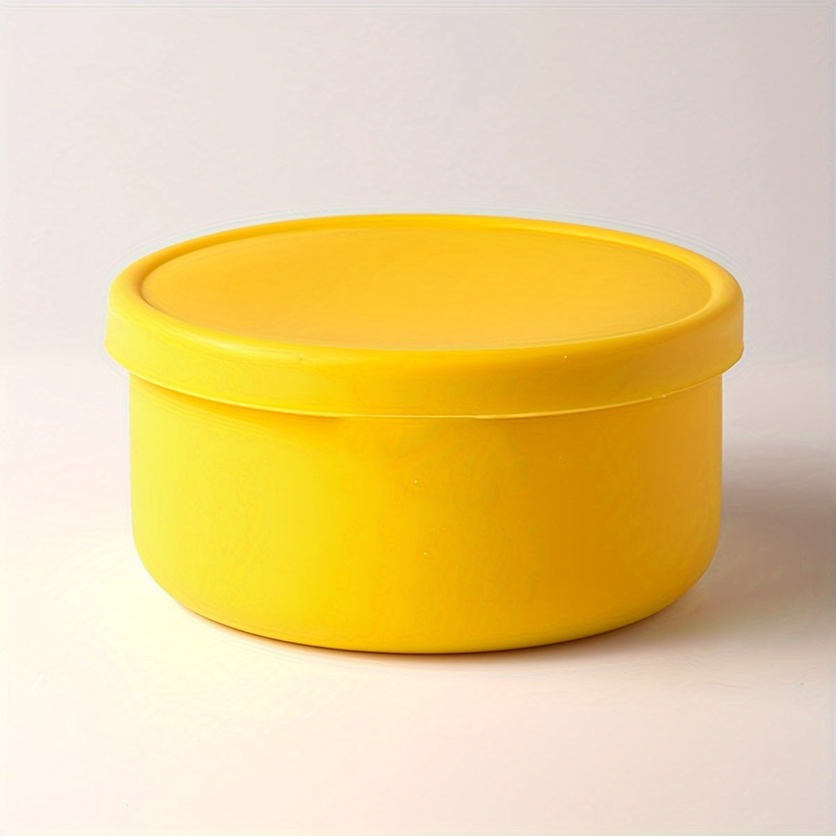 Multi-functional Storage Container made of Silicone - Does not contain BPA, can be used in the Microwave and Freezer. Ideal for storing Fruits, Vegetables, and Lunch items. Circular Kitchen Container with a convenient Flip-Top Cover.