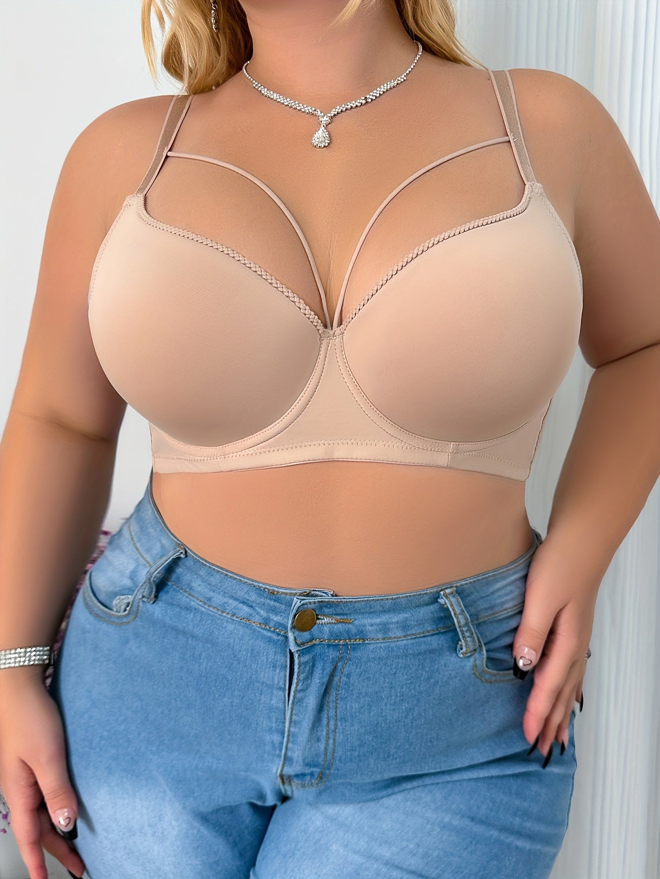 Elegant beige bra for plus size women with push-up design, underwire support, and breathable nylon blend. Hand washable and non-removable pads for comfort and sleek full coverage lingerie.