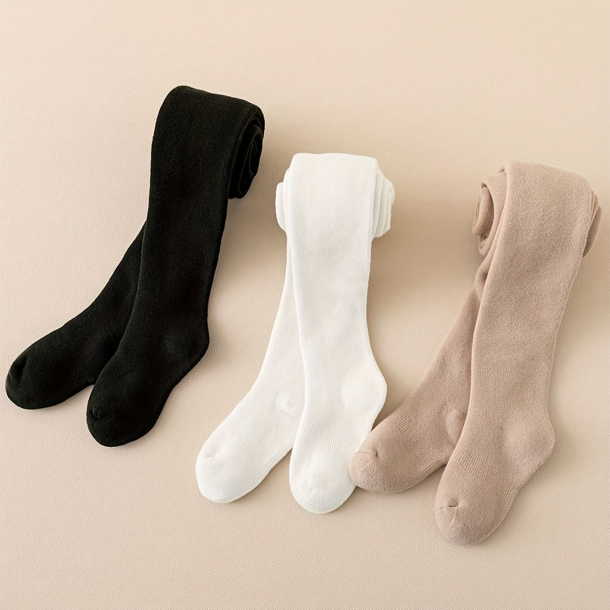 3 pairs of girl's solid knitted pantyhose for spring and autumn fashion.