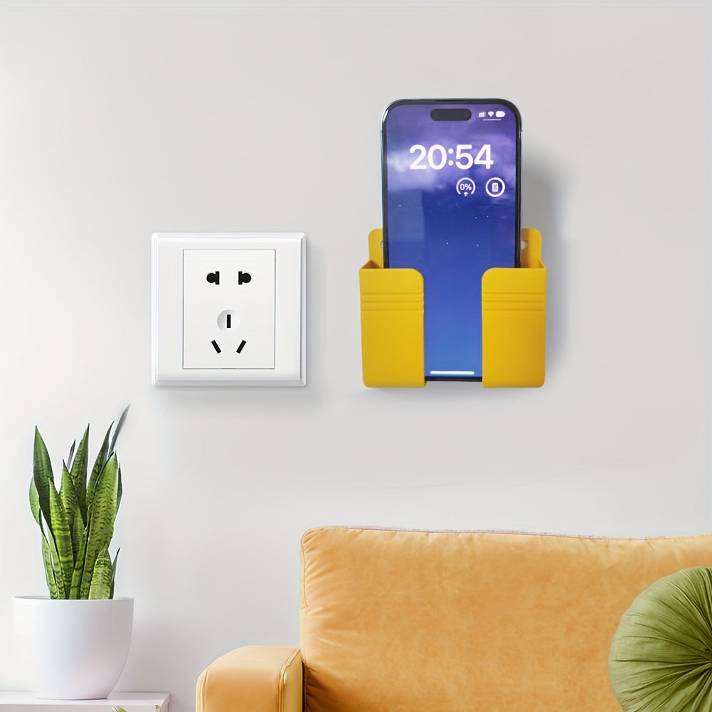 Durable wall-mounted phone holder with adhesive backing. Waterproof ABS material with cable slot and non-slip pad. Ideal for home, office, and kitchen storage.