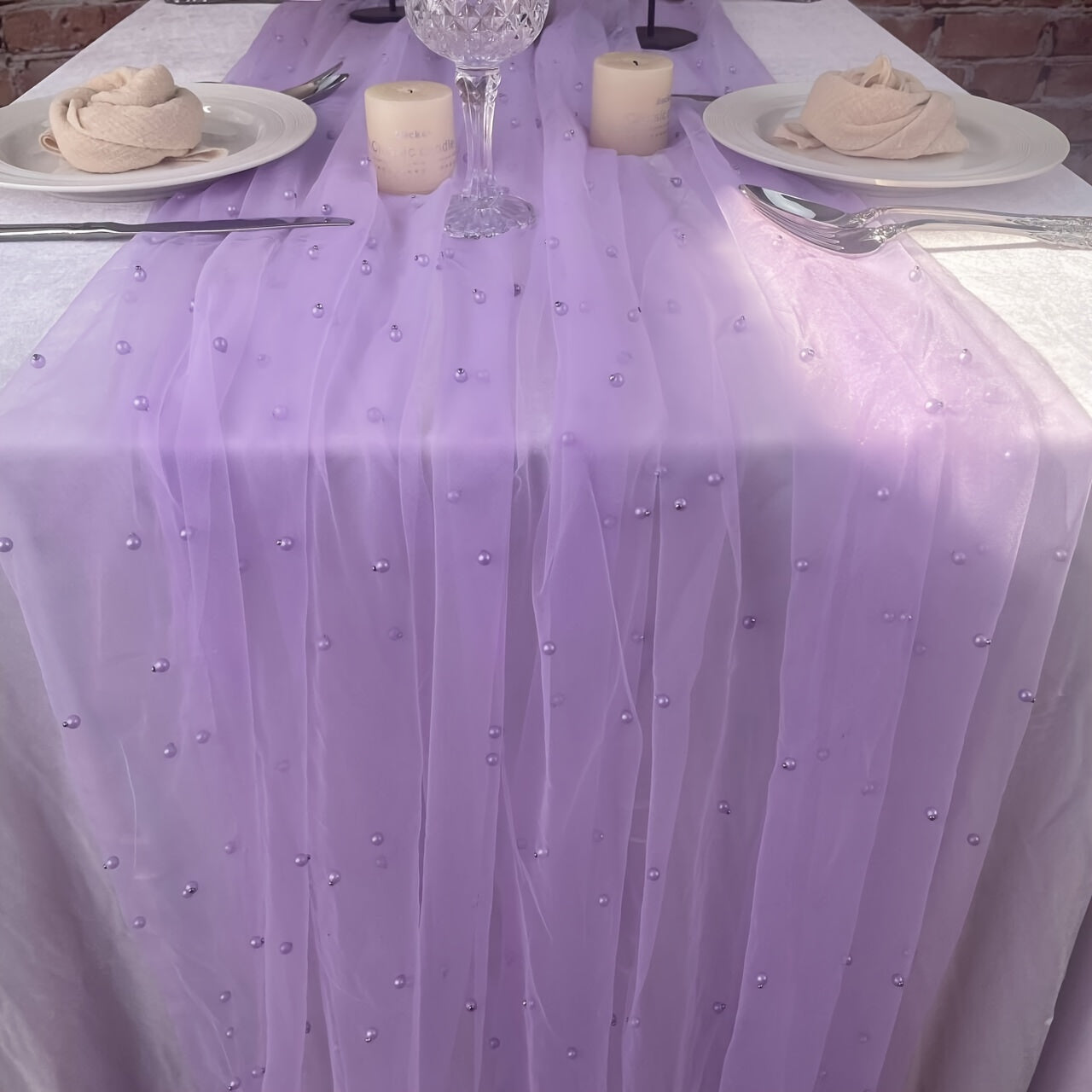 Enhance the ambiance of your special events with our Romantic Pearl Lace Table Runner. Perfect for weddings, bridal showers, and more, this elegant decoration is crafted from embroidered sheer chiffon tulle that is wrinkle-free for a luxurious look.