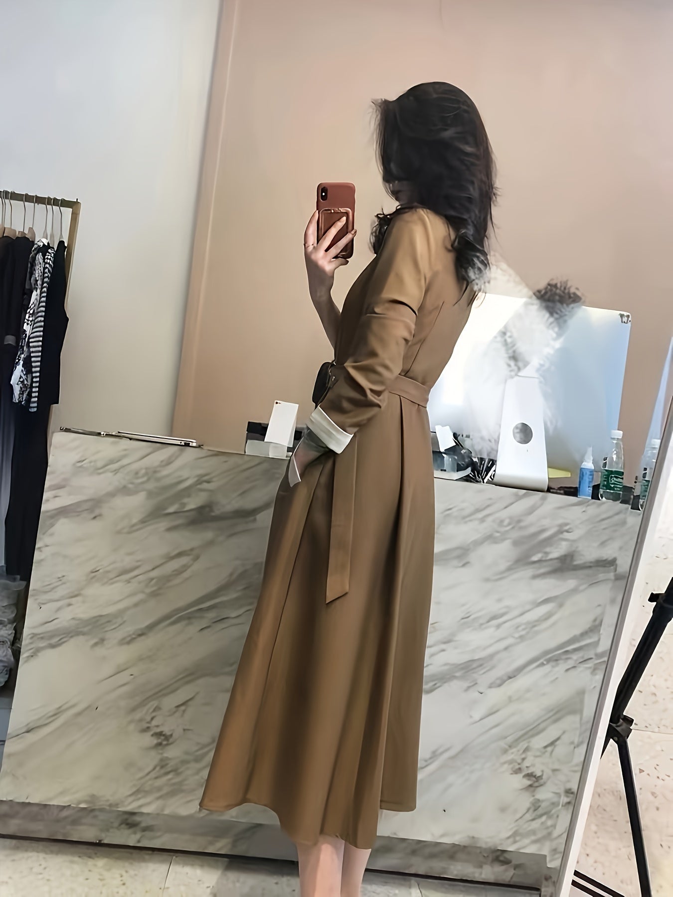 Stylish midi dress in solid brown polyester with V-neck, A-line cut, belt, and long sleeves. Suitable for spring, summer, or fall, and is machine washable.