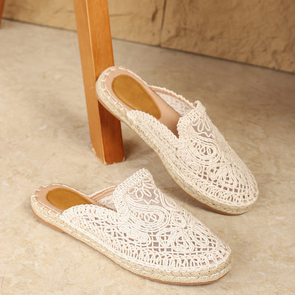 Huizhou's Summer Floral Mules for Women: Lightweight vacation slides with embroidered detailing, round toe, and flat heel, ideal for the beach.