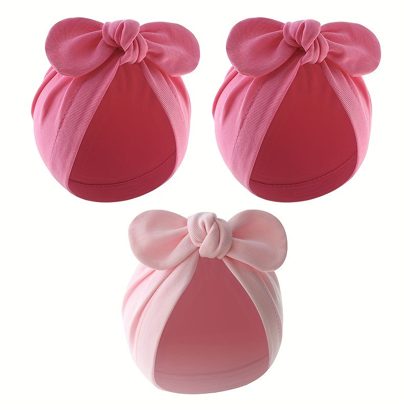 Three-pack of cotton baby turban hats with bow, suitable for newborns to 3 years old. Hand washable and lightweight, perfect for birthdays and fantasy themes.