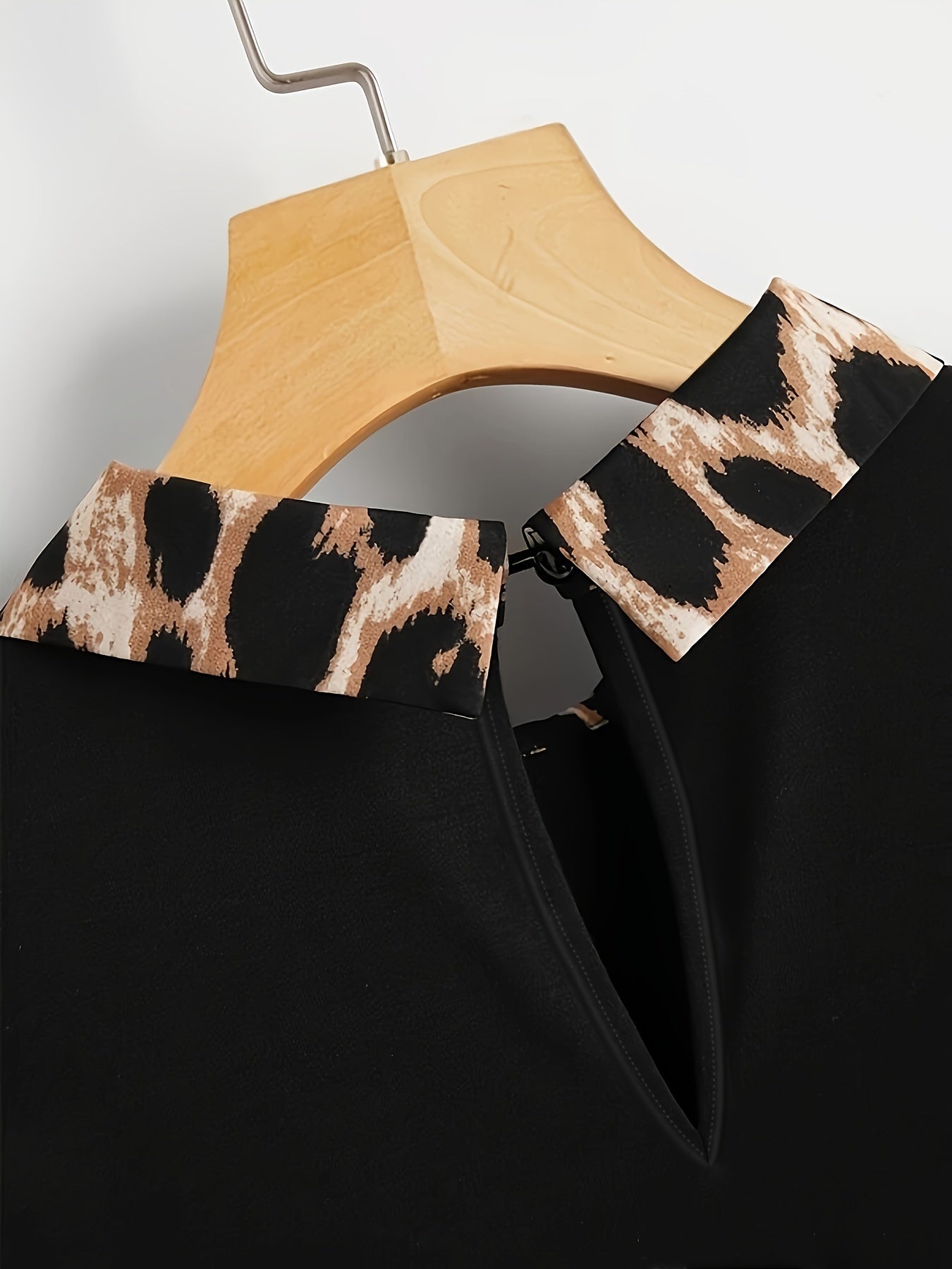 Leopard stitching sweatshirt with lapel collar for plus size women.