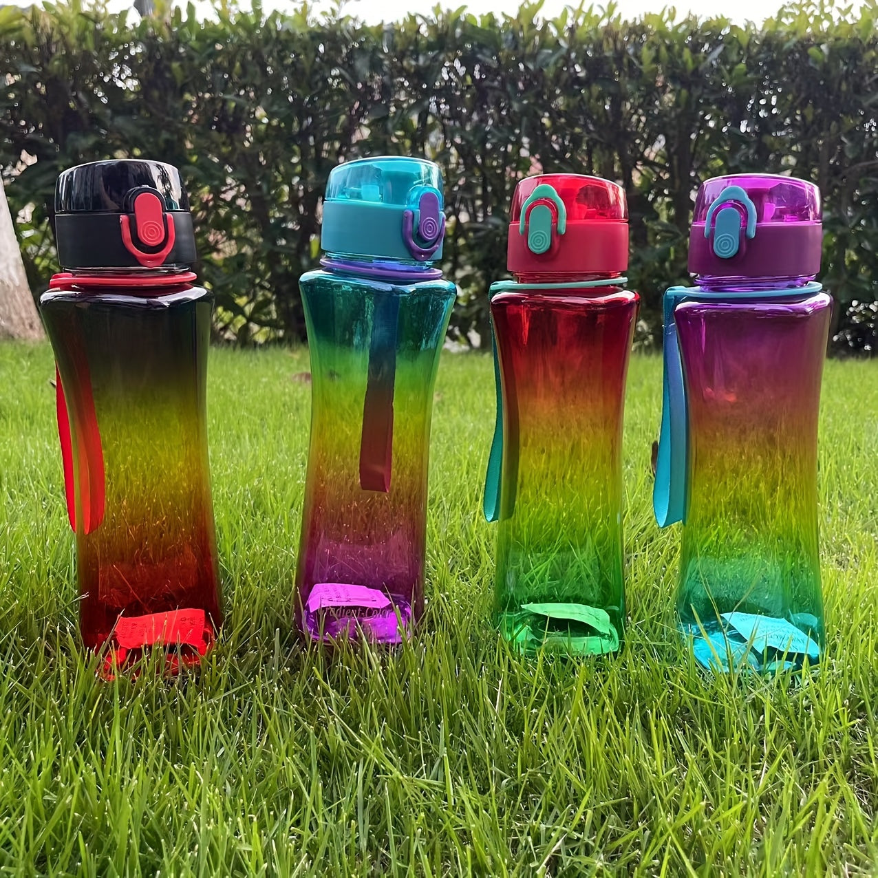 Square gradient water bottle, BPA-free plastic, leakproof seal, hand wash only, perfect for climbing and outdoor sports. Colorful rainbow design suitable for all genders, great for holiday and graduation gifts.