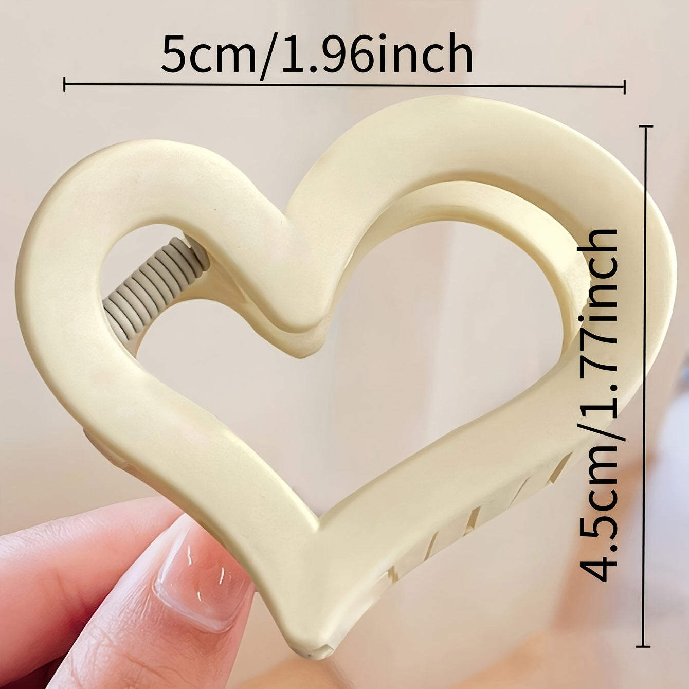 4 heart-shaped plastic hair clips for women, medium-sized with strong grip and durability, perfect for hairstyle coordination.