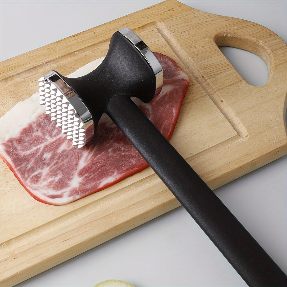 One piece of Zinc Alloy Meat Hammer, a versatile Metal Meat Pounder for household use. This Meat Tenderizer Tool is perfect for knocking meat into tender perfection in the kitchen. Also known as a Meat Tenderizer Hammer, it is a must-have among Kitchen