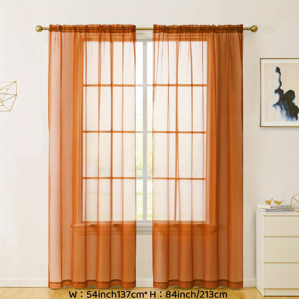 Enhance your decor with these elegant sheer voile curtain panels. Made of semi-transparent polyester, they feature a rod pocket design for easy hanging in your kitchen, bedroom, or living room. Create a romantic ambiance with these beautiful curtains.