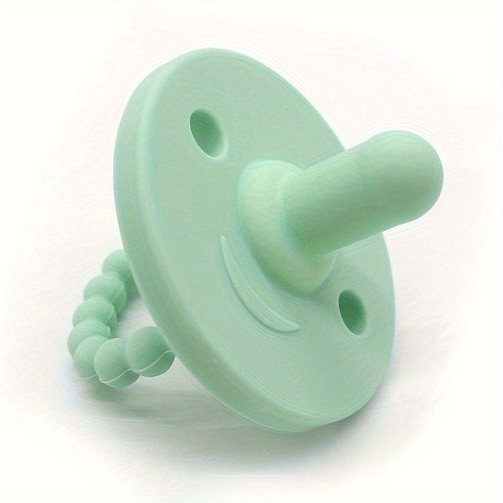 Soft silicone pacifier for newborns with cute round shape, designed to soothe and teethe. Suitable for both boys and girls.