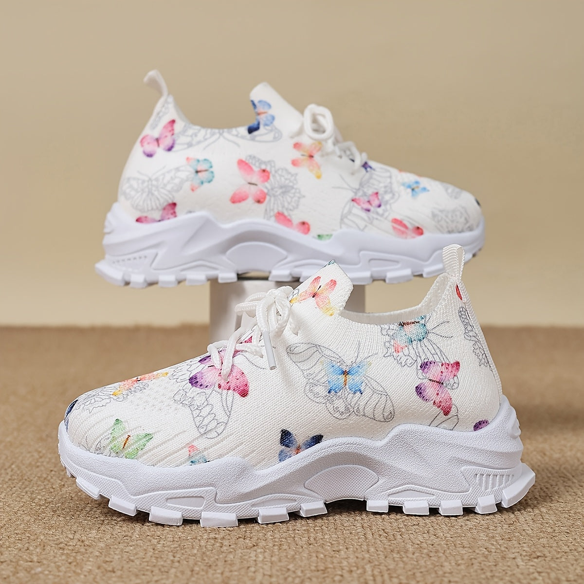 Stylish butterfly patterned running shoes for kids, with comfortable non-slip soles for outdoor sports.