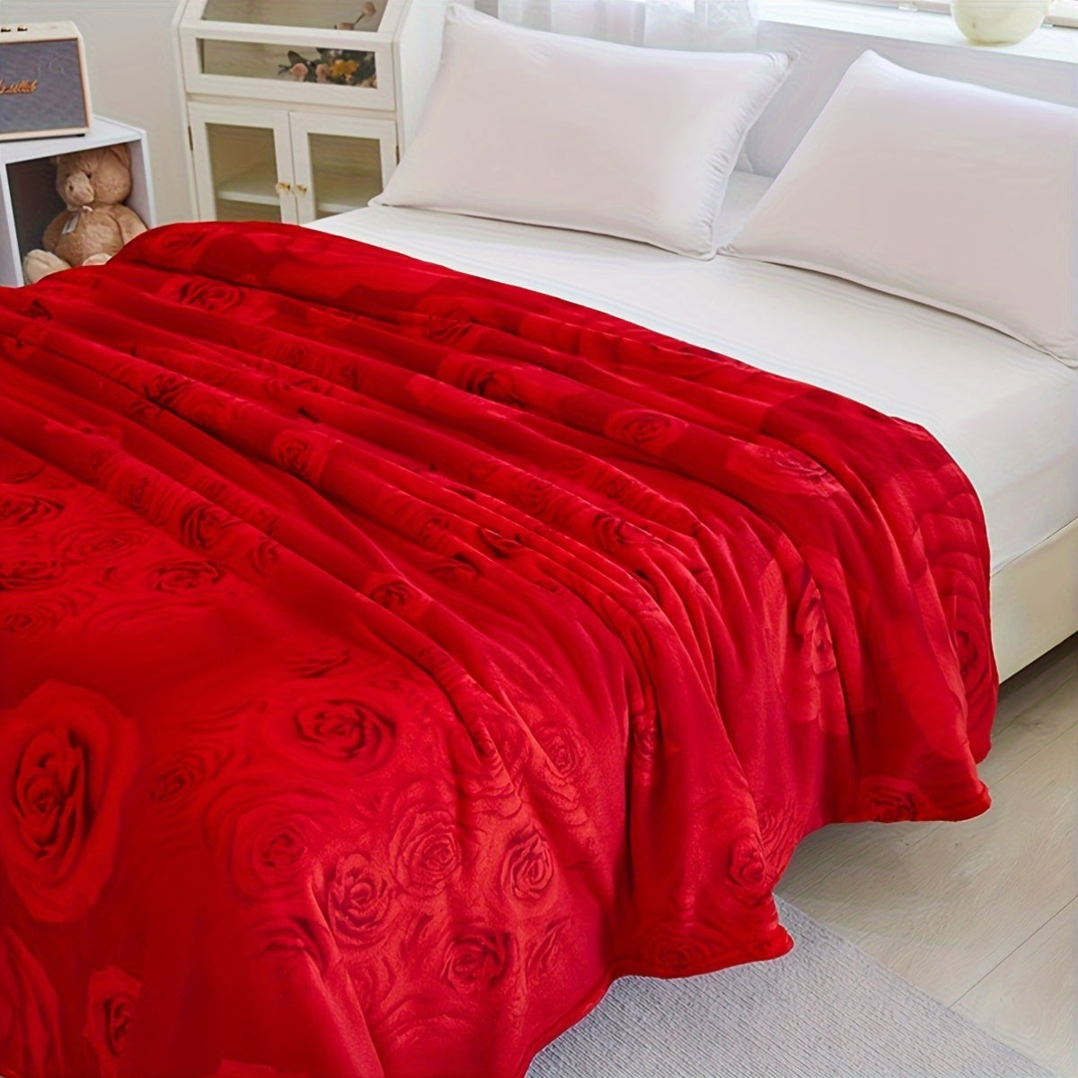 Soft warm knitted floral blanket in contemporary style with vibrant flower design. This all-season multipurpose polyester bed blanket is machine washable, featuring an embellished flower pattern.