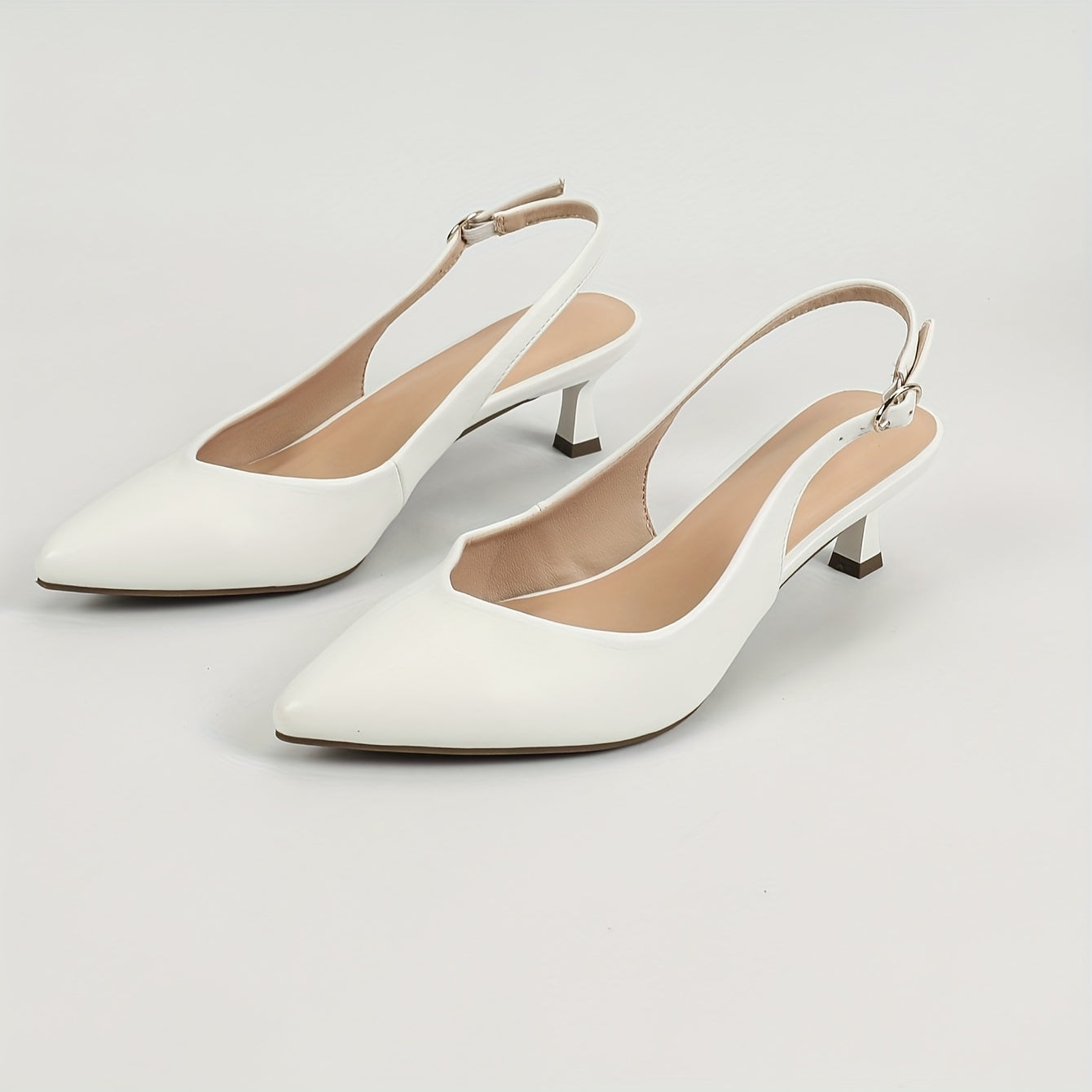 Chic and comfy pointed-toe kitten heel sandals for work.