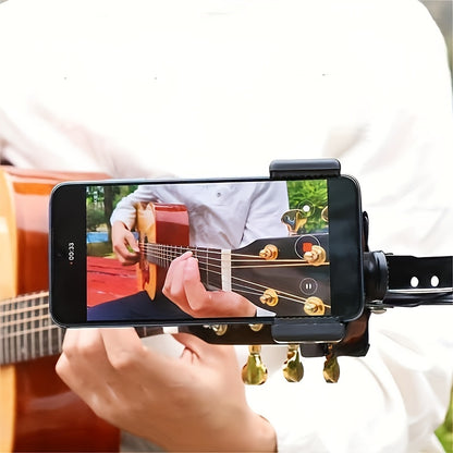 Adjustable ABS guitar headphone holder with 360-degree rotation doubles as a mobile phone stand for live streaming and music recording. Also functions as a desktop support bracket.