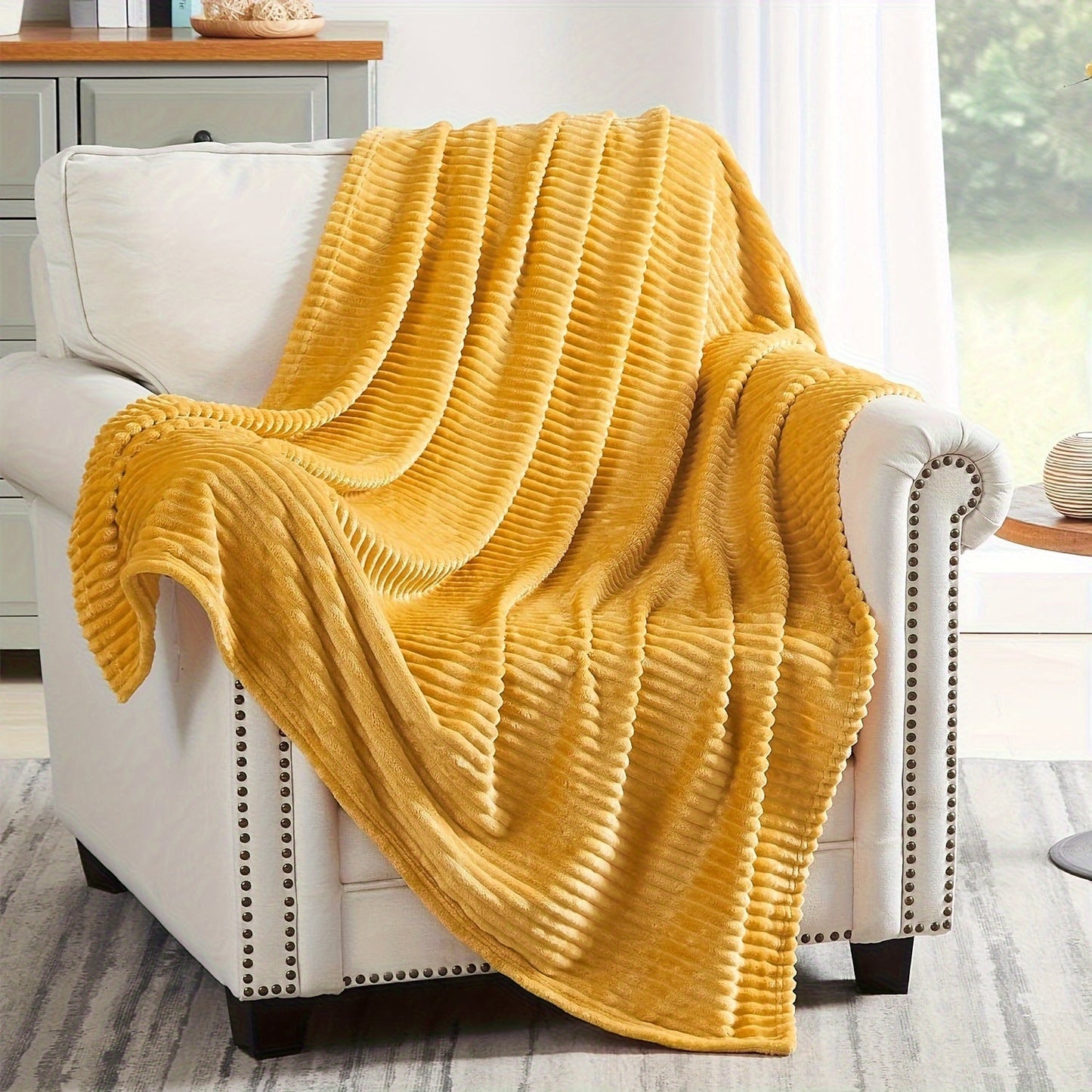 Stay cozy and warm with our Ultra-Soft Oversized Fleece Throw Blanket. Made with lightweight and warm 280GSM microfiber, this blanket features a 3D ribbed Jacquard design for added style. Hypoallergenic and perfect for all seasons, this blanket is a