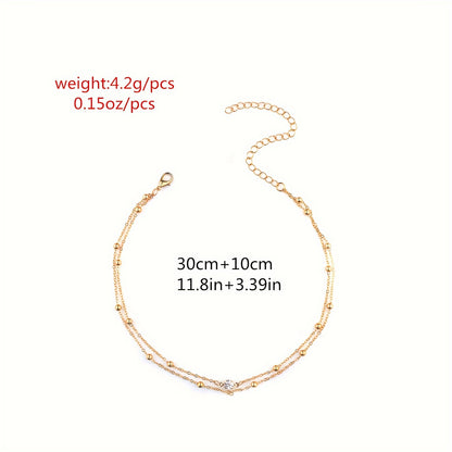 Golden-tone beaded body chain necklace with rhinestone detailing, perfect for parties and dates, versatile for all seasons.