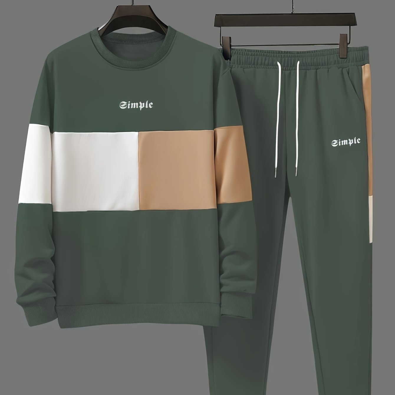 Men's casual crew neck sweatshirt and joggers set. Color block design in polyester blend, machine washable. Ideal for spring and fall, leisure style.