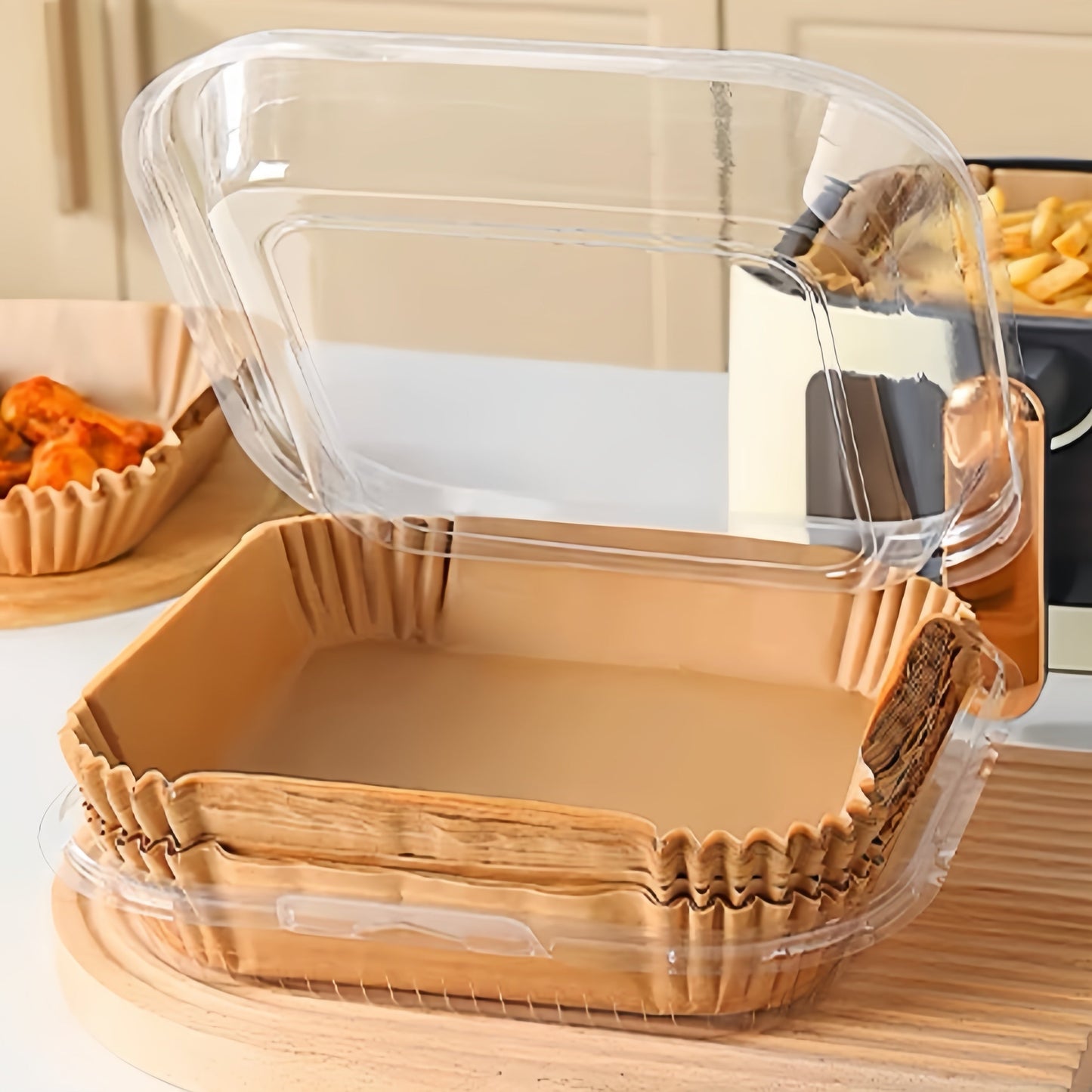 100 square parchment liners designed specifically for air fryers that measure 22.86 cm, ideal for 5 to 8 quart air fryers. These liners feature a non-stick and waterproof design.