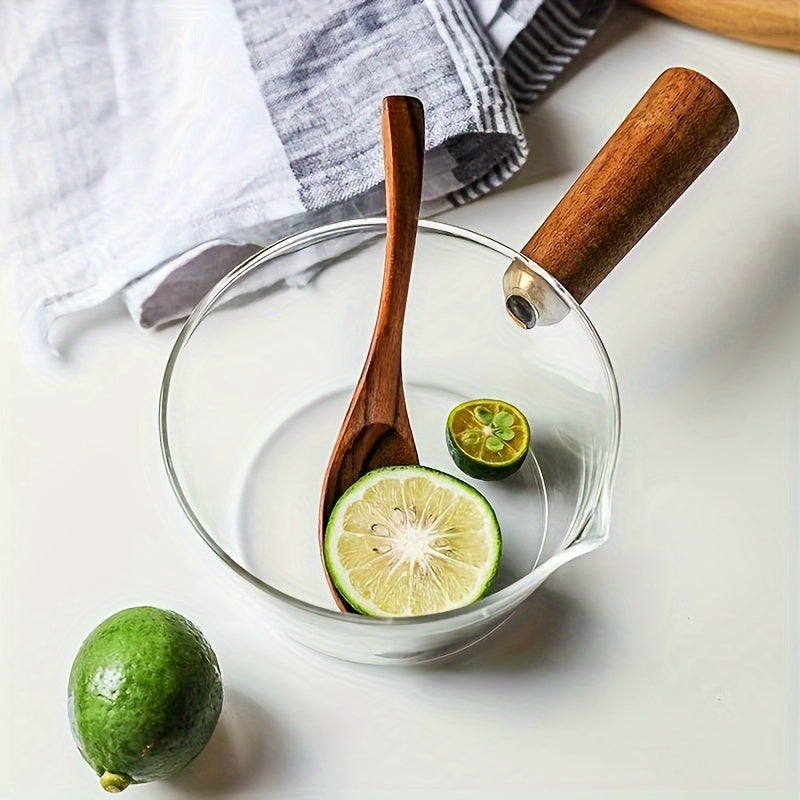 A versatile wooden-handled glass pot set for milk, soup, and noodles including small and large cups. These pots are thickened and heat resistant, perfect for home cooking. Ideal for use in the kitchen as small tools.