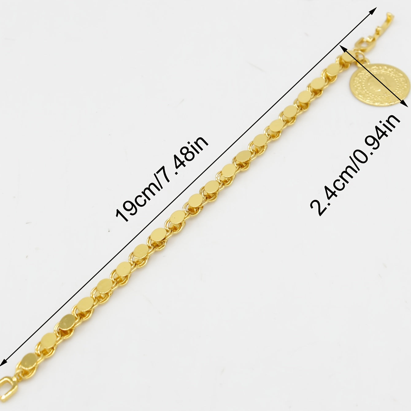 A handmade bracelet adorned with a gold-plated Turkish lira pendant, perfect for everyday or special occasions.