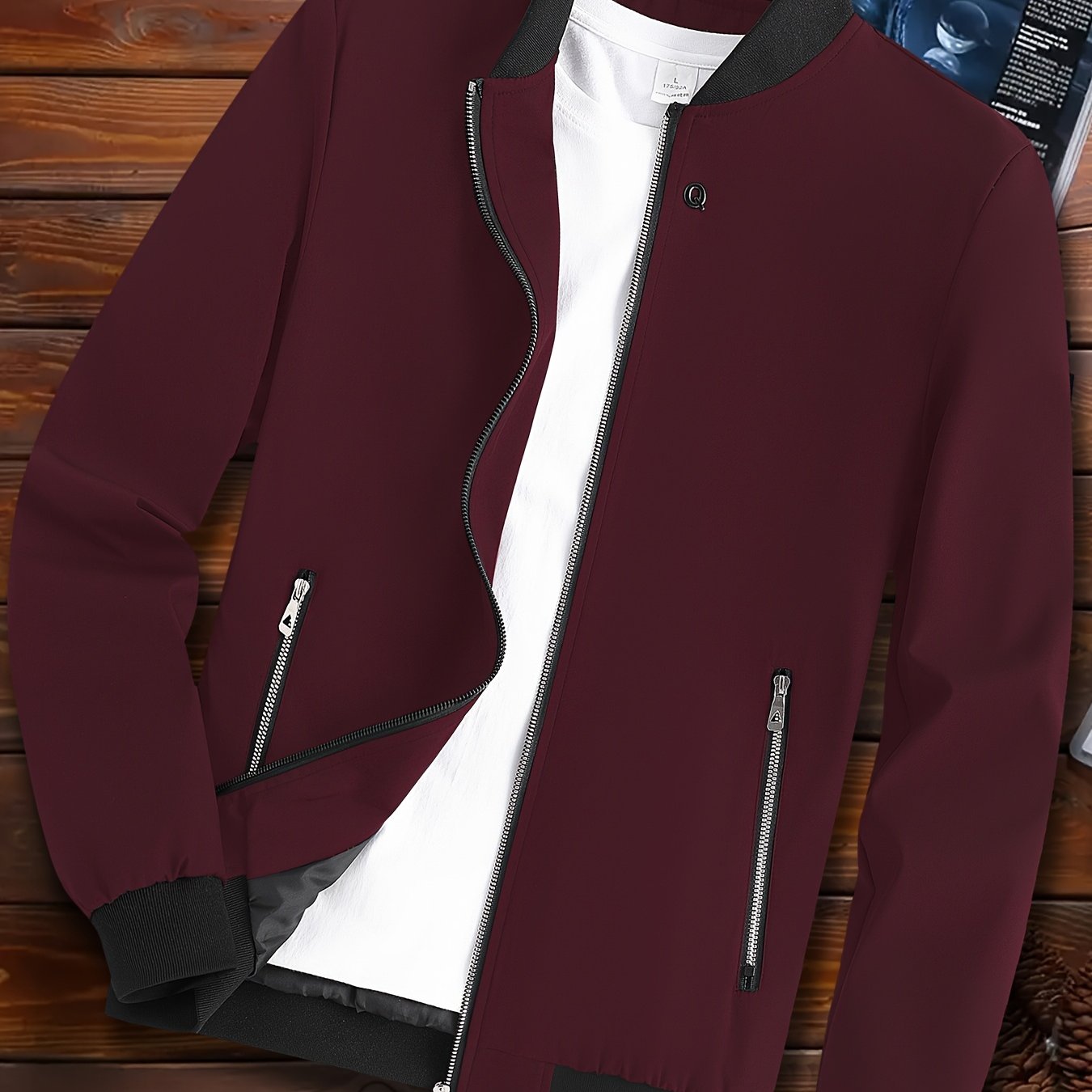 Casual men's windproof jacket with pockets for spring and fall, featuring a lightweight design and stand collar.