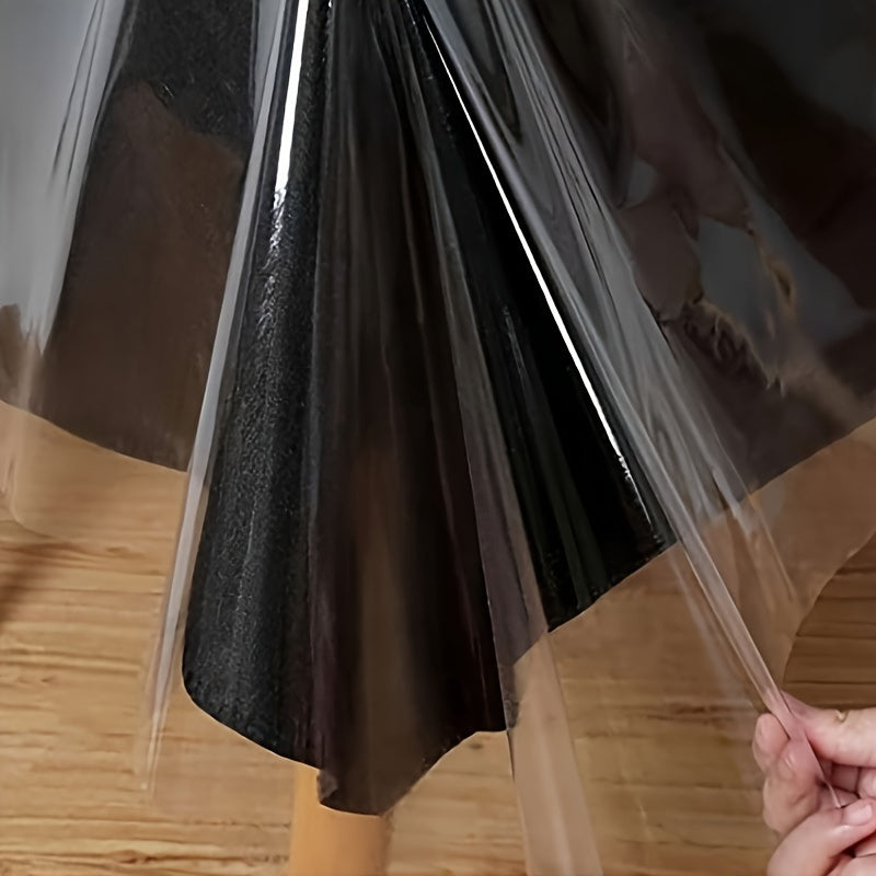 Clear PVC tablecloth for dining, parties, and camping. Oil-proof, easy to clean, and transparent. Cut-to-size design for versatile use in home and kitchen decor.