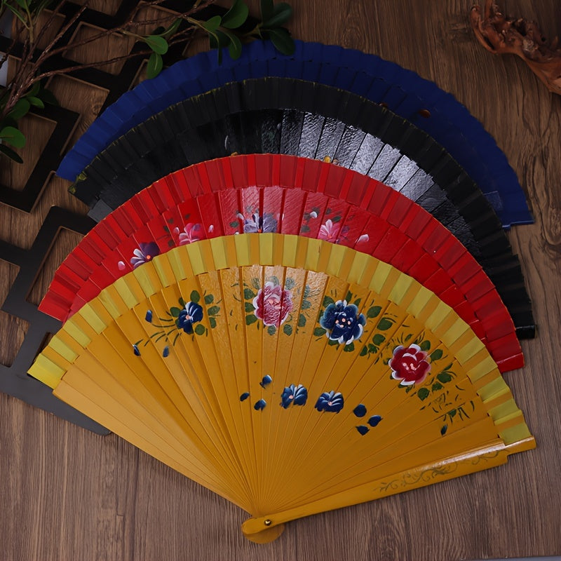 Wooden Spanish folding fan for dancing and home decoration with printed design, conveniently folds for easy storage.