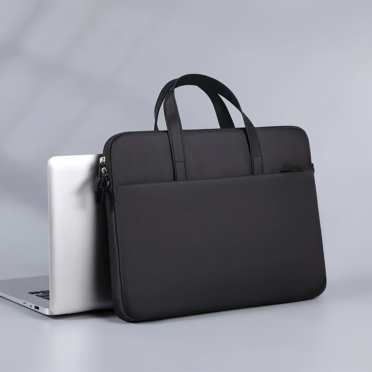 Simple and lightweight laptop bag suitable for business trips, waterproof with zip closure, perfect as a protective case for your computer. Also great for school or as a Valentine's gift.