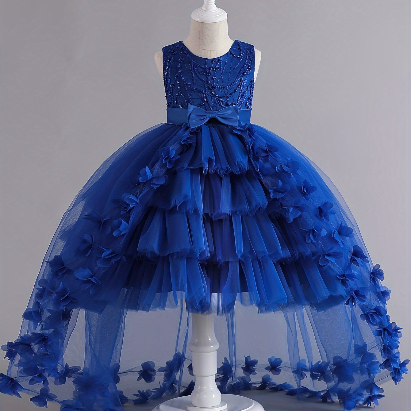 Girls' sleeveless princess gown with floral embroidery and tulle skirt, perfect for pageants, weddings, and formal events. Machine washable, made of polyester.