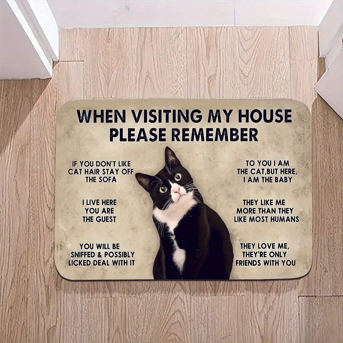 Welcome cat lovers with this non-slip polyester doormat featuring a cute cat print. This machine washable mat is lightweight and has a knit weave, making it perfect for use in the bathroom, entrance, hallway, or bedroom. Made from comfortable soft