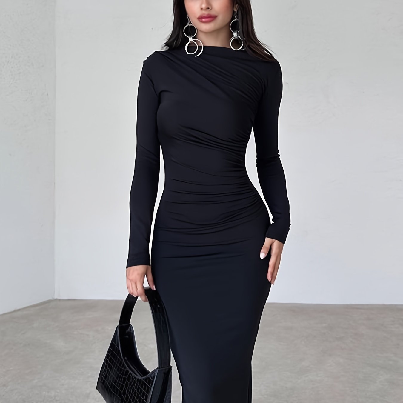 Women's long sleeve pencil dress made from 95% polyester and 5% elastane knit fabric. Features solid color sheath with draped detail, conventional collar, all-season long length, and side