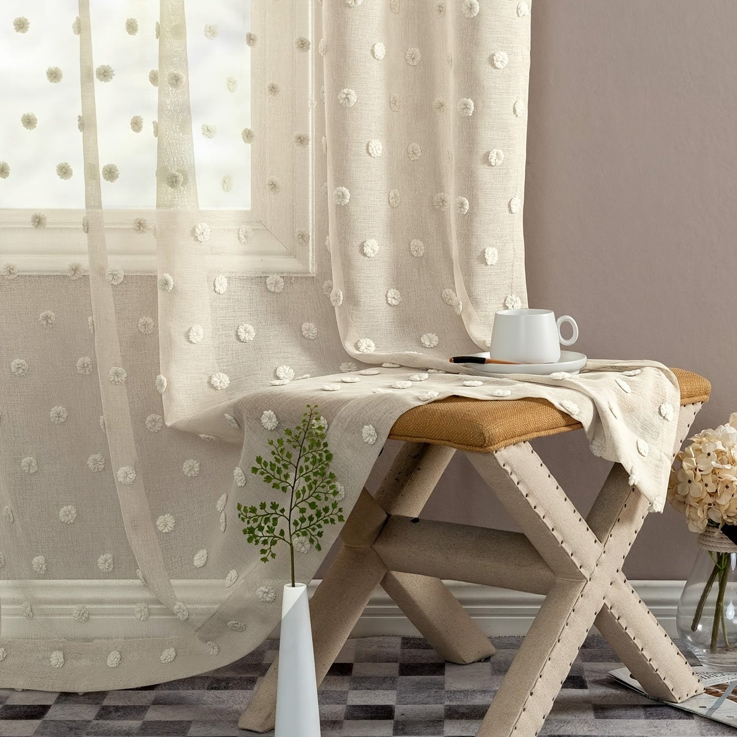 Sheer panel with rod pocket top featuring boho-style polka dot embroidery - crafted from imitation hemp fabric. This machine-washable drapery offers room darkening benefits for a variety of living spaces. With easy hanging and a fresh minimalist design